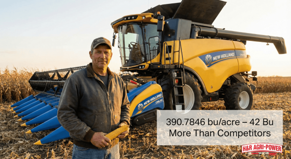 Farmer Ben Kron beside New Holland combine after record-breaking corn yield.