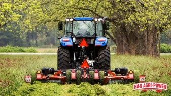 blue tractor rhino rotary cutter pasture