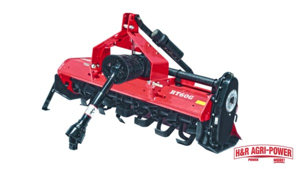 Red Bush Hog rotary tiller designed for compact tractor soil preparation