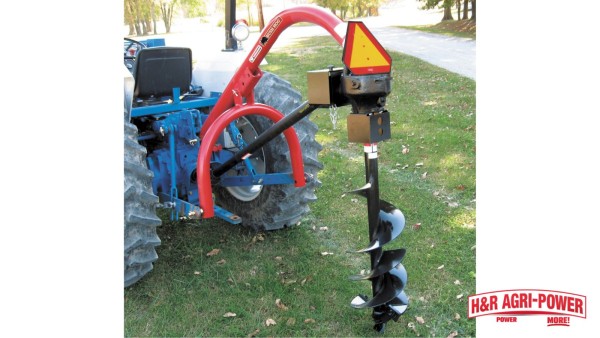 Bush Hog post hole digger attached to tractor with PTO-driven auger for compatibility checks