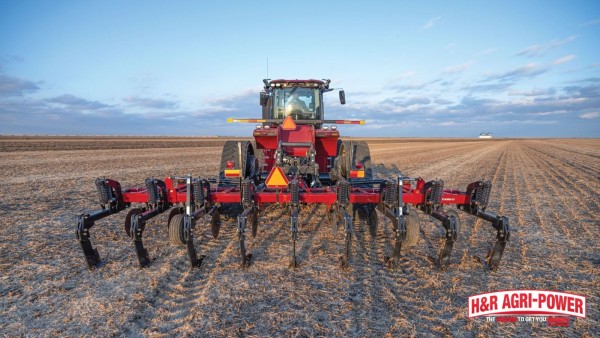 Case IH tractor pulling a tillage implement across a harvested field for compaction relief
