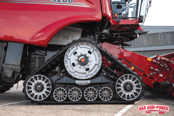 Close-up of Case IH track system designed for traction and stability, highlighting tire and track maintenance for rough terrain