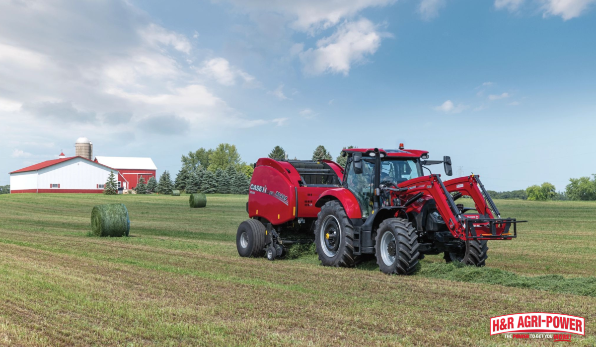 featured case ih tractor round baler hay field