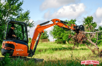 kubota compact excavator farm clearing brush