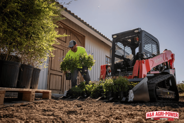 Kubota skid steer used for farm operations supporting multi-farm fleet management decisions