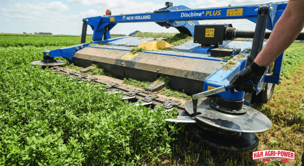 New Holland Discbine mower using MowMax cutterbar to cut forage crop cleanly.