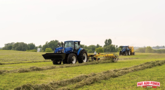 new holland tractor rake forage harvest field