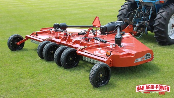 Close-up of Rhino rotary cutter deck, wheels, PTO driveline, and mounting components