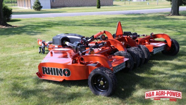 Rhino rotary cutter with heavy-duty blade deck for mulching dense field vegetation
