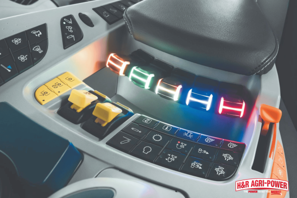 Tractor control panel with illuminated hydraulic controls, representing the process of bleeding air from hydraulic lines