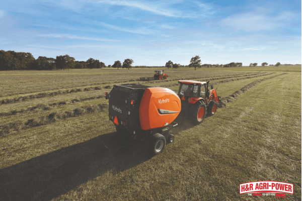 Hay equipment setup in the field representing the importance of carrying spare parts and repair tools for quick fixes during hay season.