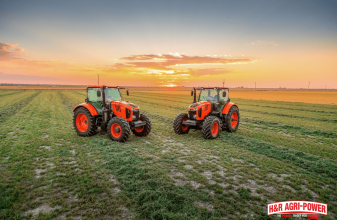 kubota tractors field sunset spring preparation
