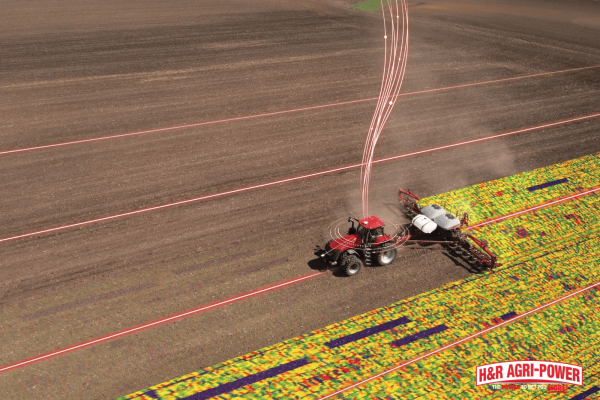 GPS-guided tractor using precision farming equipment with field mapping and variable-rate data visualization